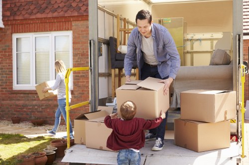 Removal van and packed boxes for a Hampton Hill house move