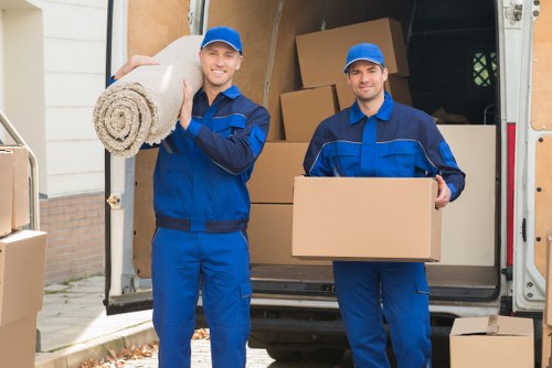 Loading household belongings into a moving van for a Hampton Hill move