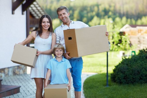 Local removals team handling furniture for a Hampton Hill move