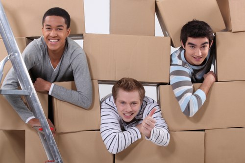 Packed boxes and household items ready for transport in Hampton Hill