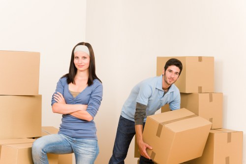 Careful loading of office items for a move near Hampton Hill