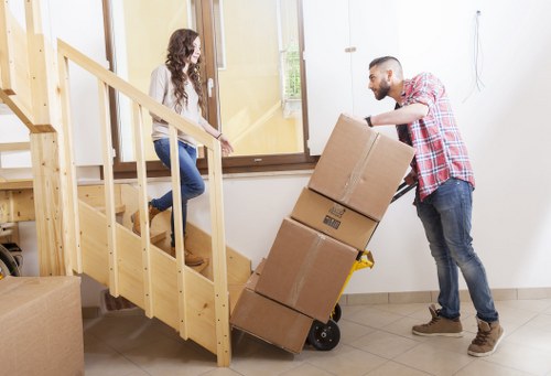 Furniture and packed boxes for a Hampton Hill move